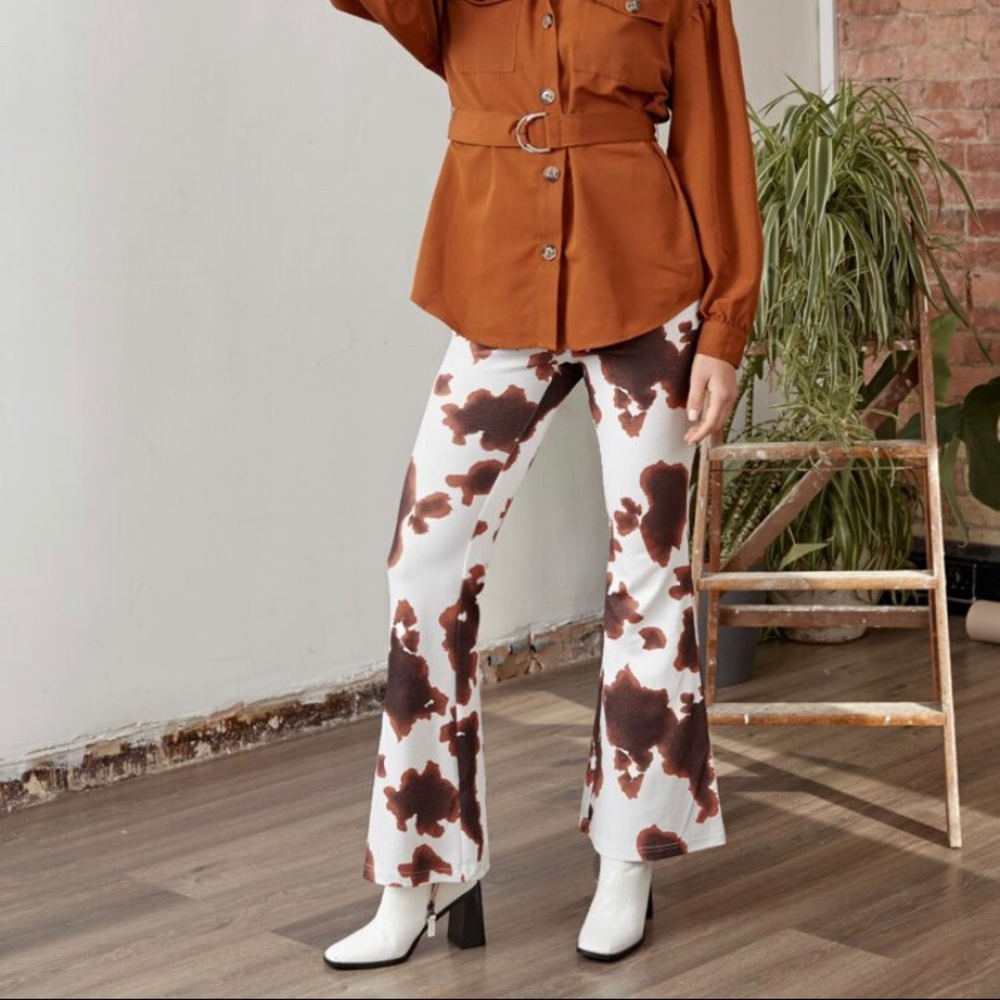 SOLD brown cow print flare pants NWT